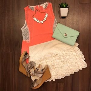 Ivory layered lace skirt.